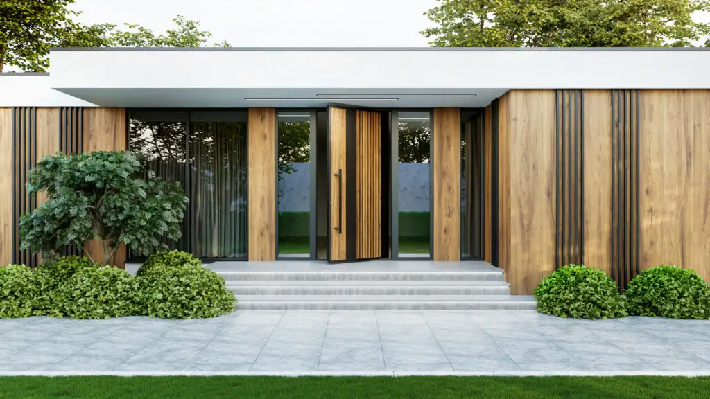 Modern European pivot entry door on a contemporary home exterior