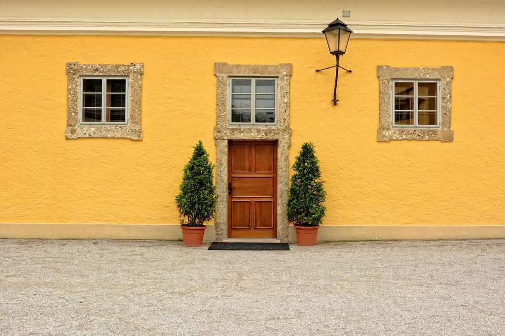 Front entrance of a home with a storm door