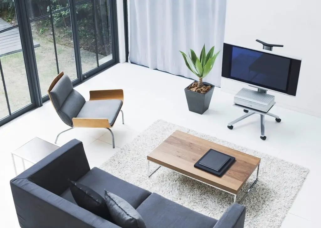 Bright modern living room with large triple-pane windows