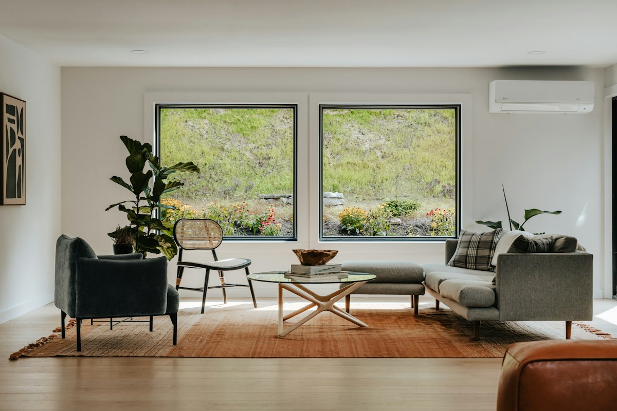 Modern home interior with large European windows
